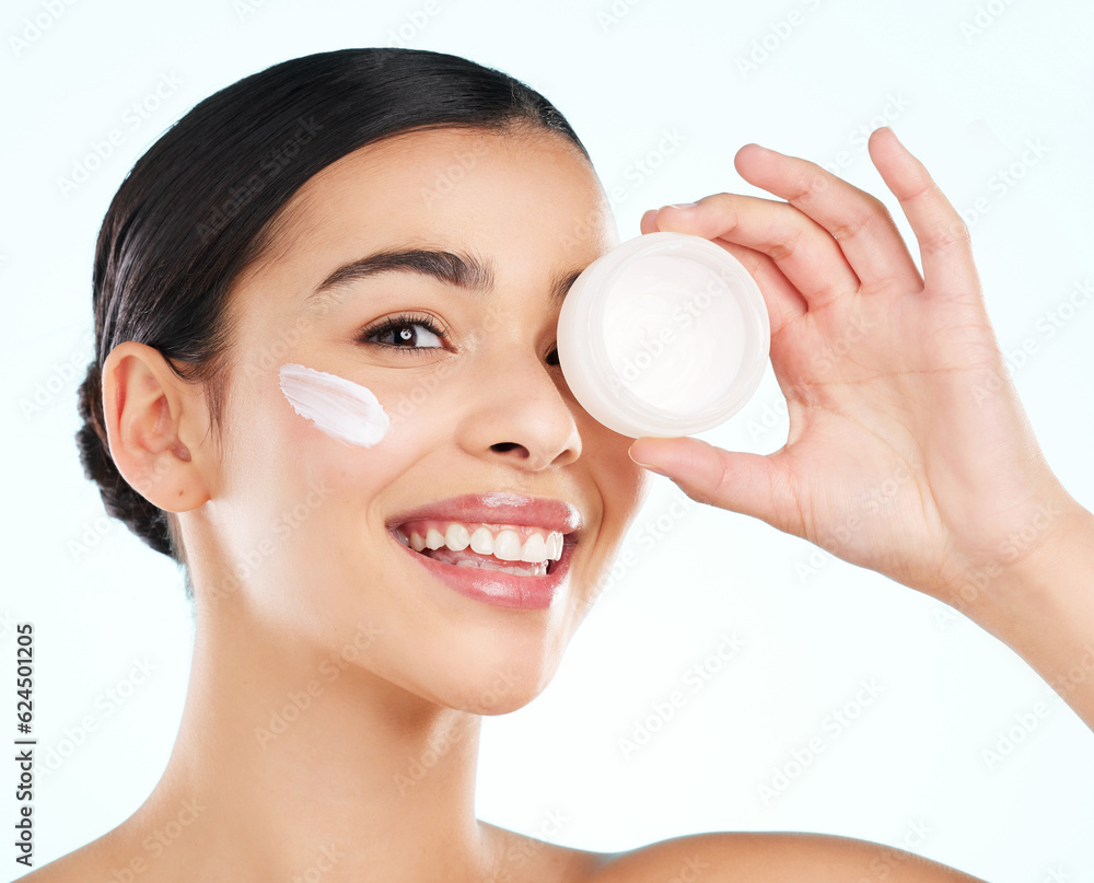 Face, skincare and woman with cream container in studio isolated on a white background. Portrait, de