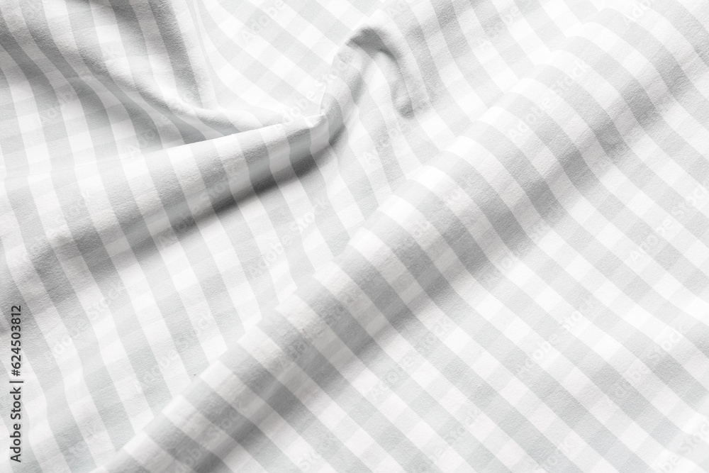 Clean checkered napkin as background, closeup