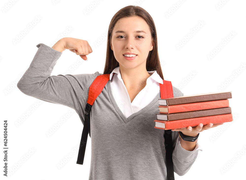 Female student with books showing muscles on white background