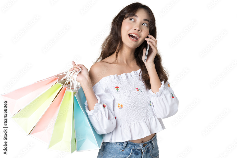 Young Asian woman usin shopping bag using phone on isolate background