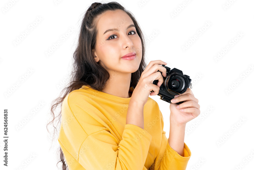 Young beauty Asian woman using camera to take photo and she wearing a yellow sweater shot isolated o