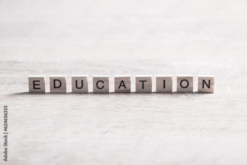 wooden elements with the letters collected in the word education