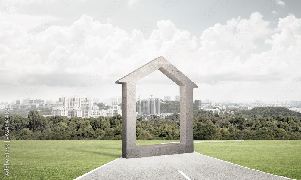 Conceptual background image of concrete home sign on asphalt road