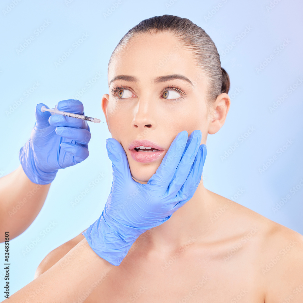 Face, beauty and woman with plastic surgeon or injection for transformation in studio with blue back