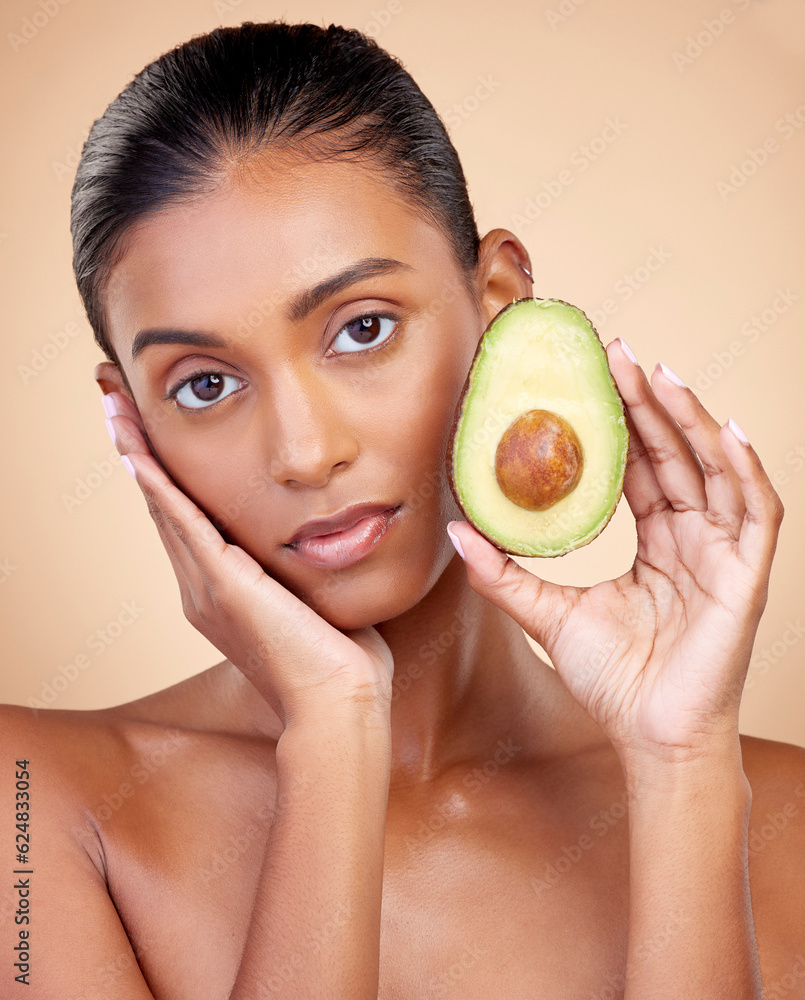 Avocado, beauty and woman in portrait for healthy face and natural skincare on studio brown backgrou