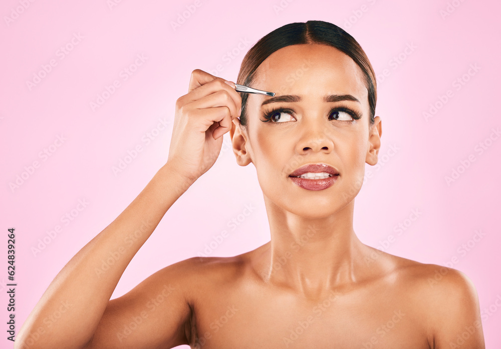 Face, pain and woman with tweezer for eyebrow in studio isolated on a pink background. Beauty, facia