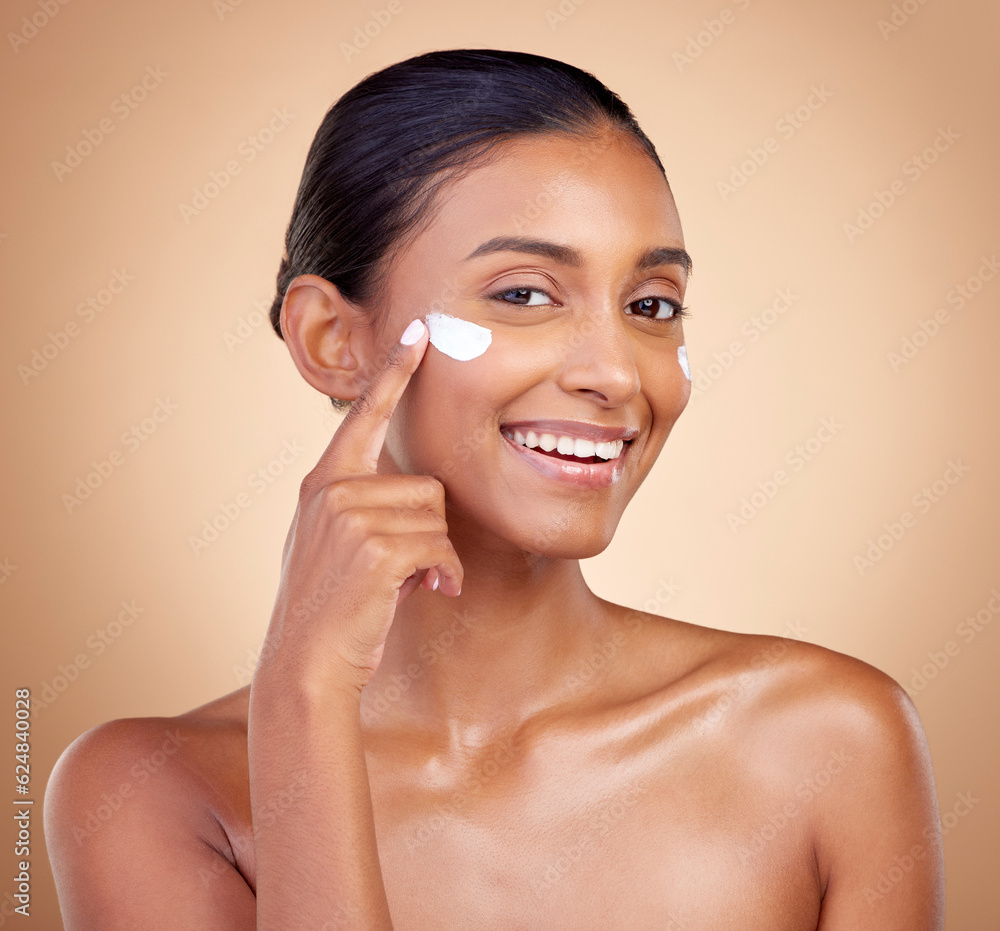 Face, cream and portrait of happy indian woman, makeup cosmetics and skincare dermatology on studio 