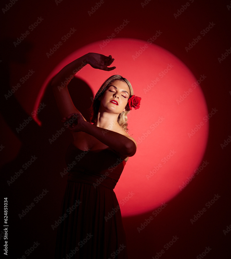 Vintage, creative and a woman in a spotlight on a studio background for an art aesthetic. Fashion, r