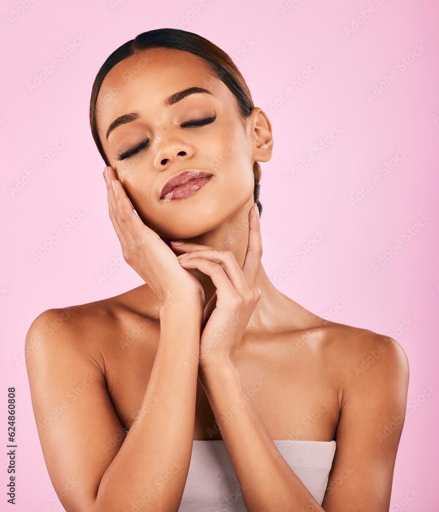 Woman, hands touching face and beauty with natural cosmetics and shine isolated on pink background. 