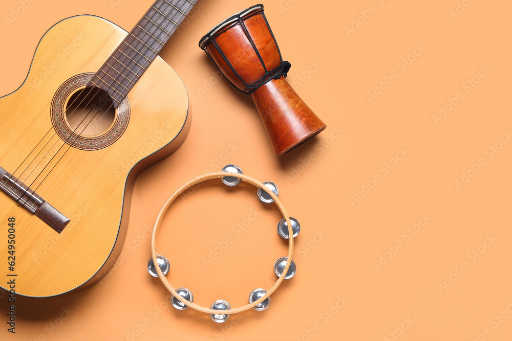 Different musical instruments on color background