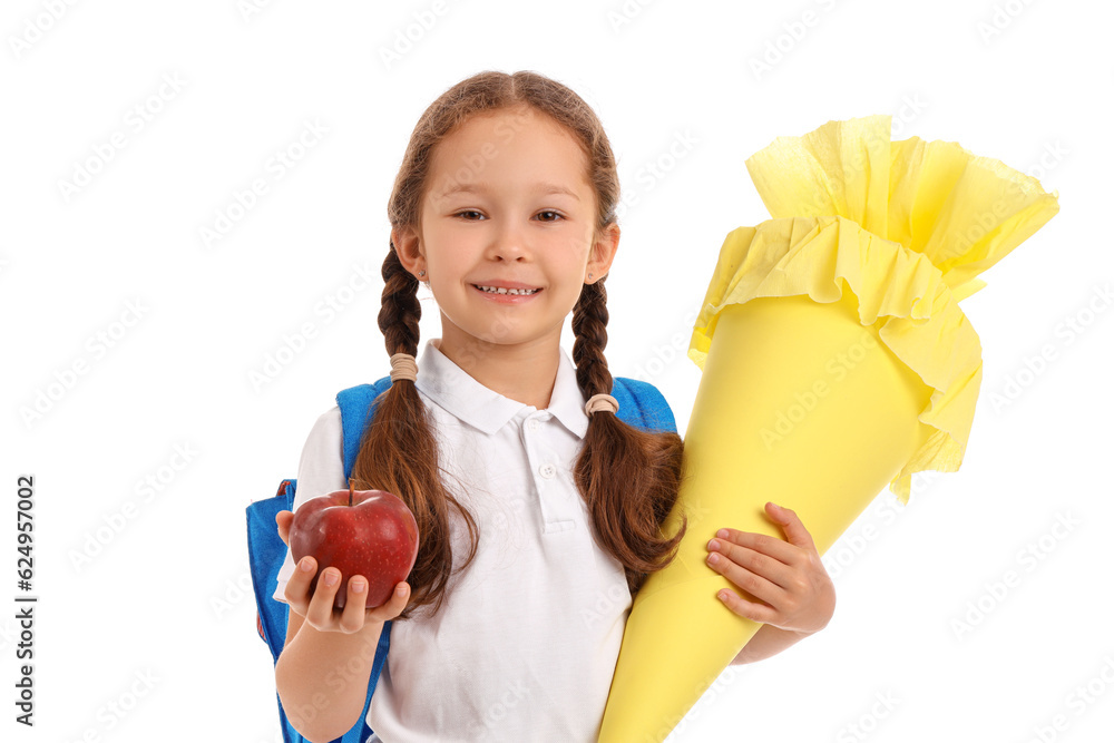 Little girl with backpack, yellow school cone and fresh apple isolated on white background