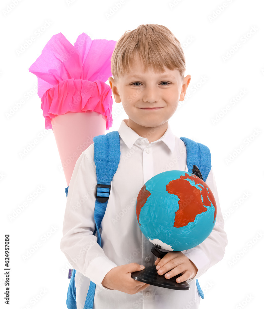 Little boy with backpack, pink school cone and globe isolated on white background