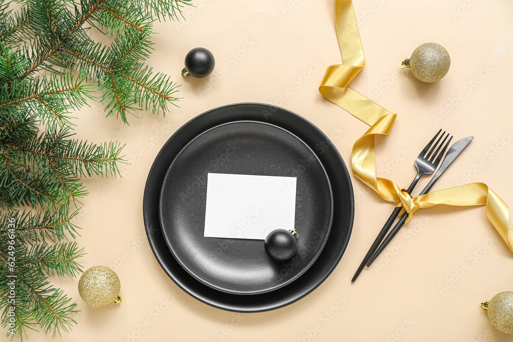 Beautiful table setting for Christmas celebration on beige background