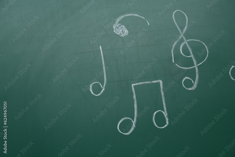 Different music notes on green background