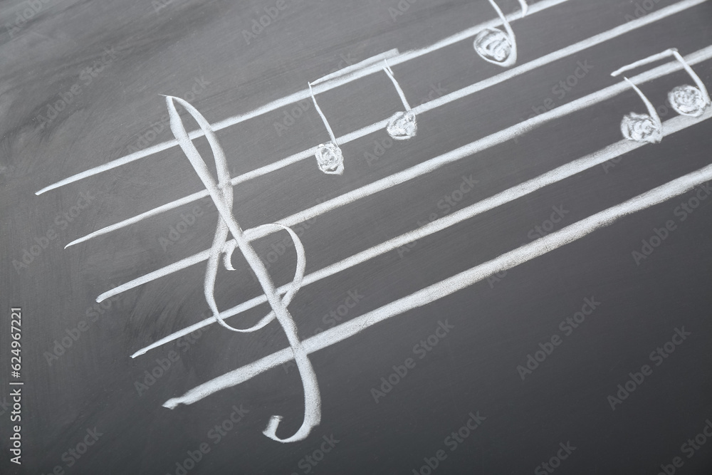 Different music notes on black background