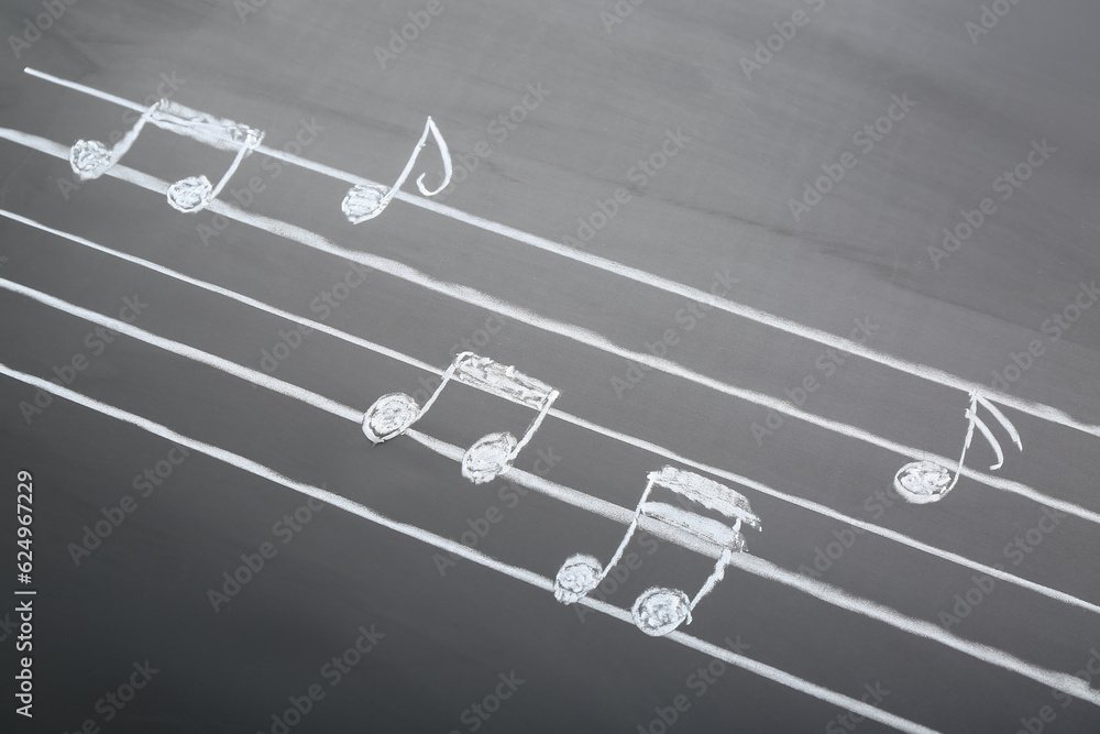 Different music notes on black background