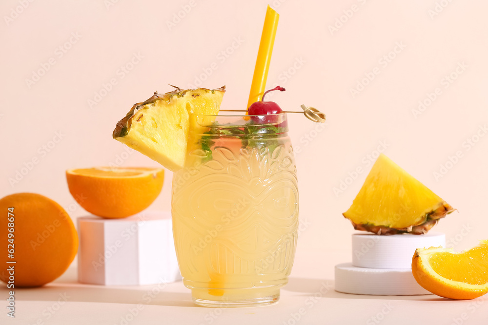 Glass of tasty mai tai cocktail on light background