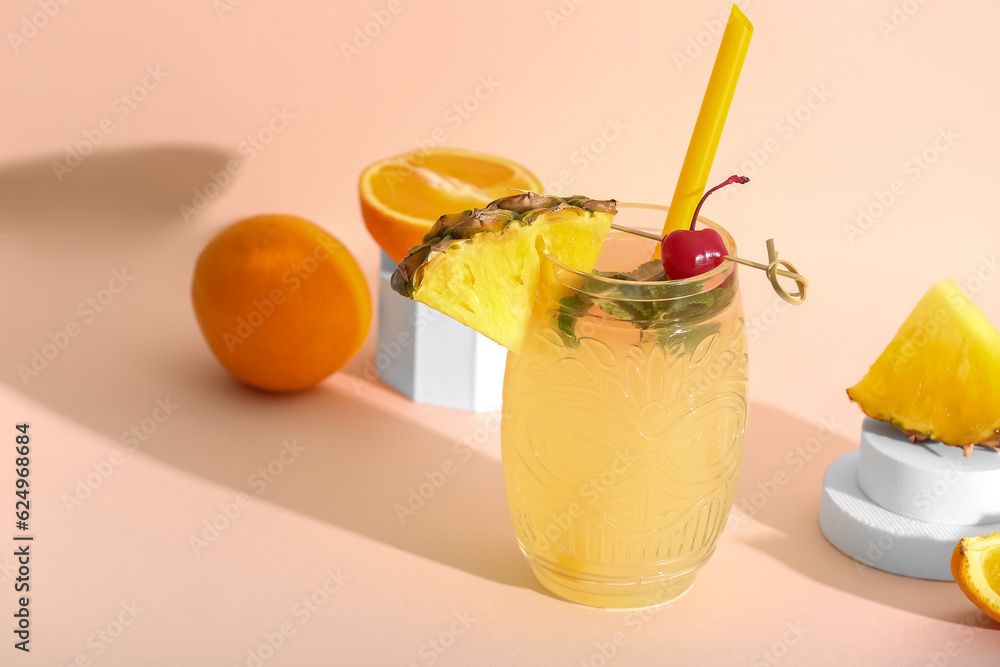 Glass of tasty mai tai cocktail on light background