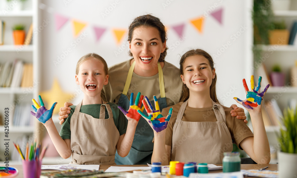 kids and teacher at the art class