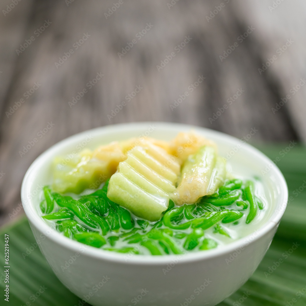 Close up of Lod Chong Thai dessert made from rice flour on top coconut syrup and pandan leaf on the 