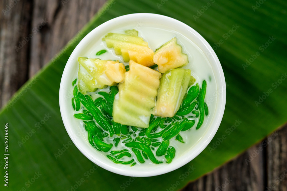 Top view of Lod Chong is a dessert made from rice flour. green from pandan leaves and fresh coconut 