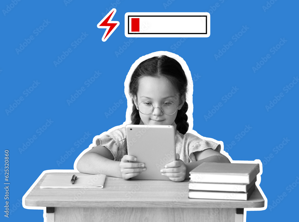 Tired little girl with tablet computer sitting at desk against blue background