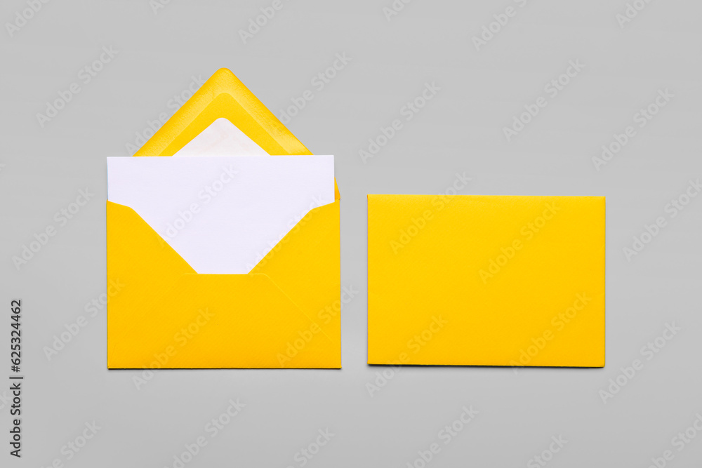 Envelopes with blank card on white background