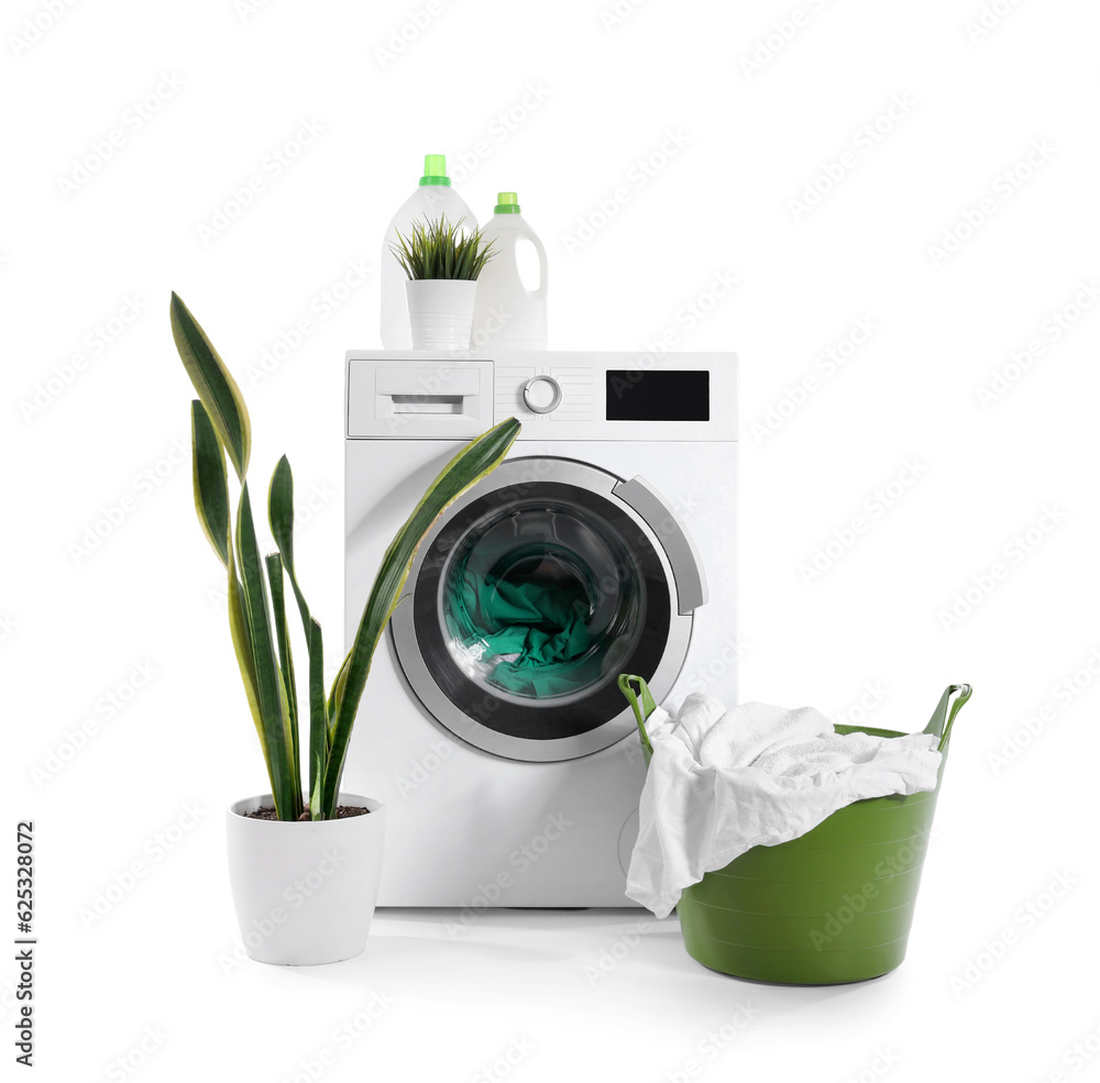 Washing machine, bottles of detergent, basket with dirty laundry and houseplant isolated on white ba