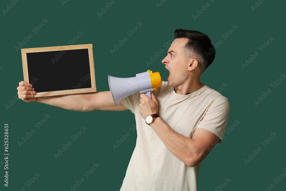 Male teacher with chalkboard shouting into megaphone on green background