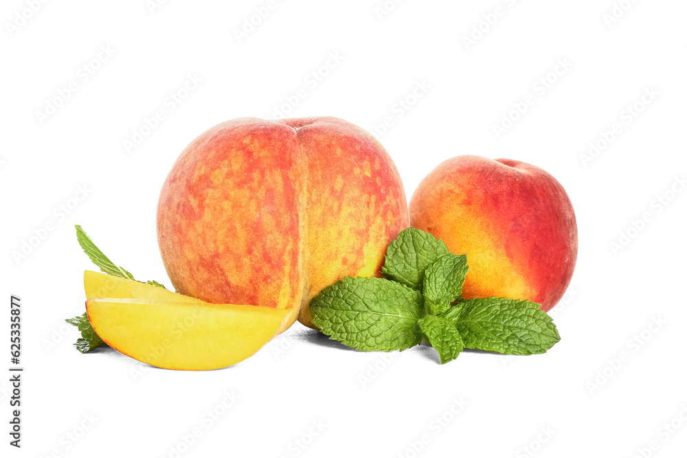 Fresh peaches and mint on white background