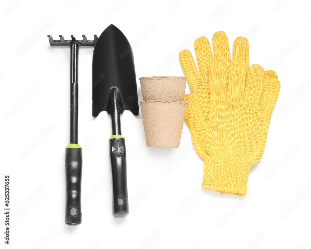 Different gardening tools on white background