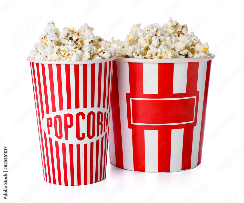 Buckets with tasty popcorn on white background