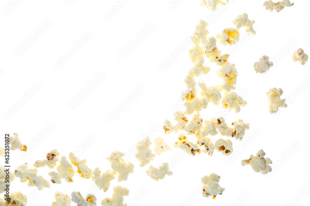 Flying tasty popcorn on white background