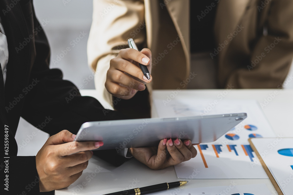 Businesswoman discussing with colleagues at work about work and presenting ideas for starting a new 