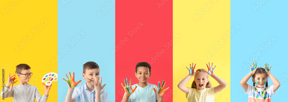 Collage of happy little children with palms in paints, brush and palette on color background