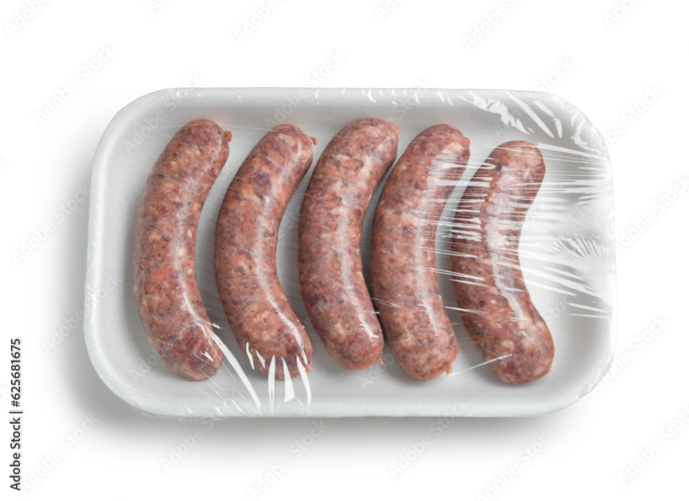 Raw pork sausages in plastic packaging on white background