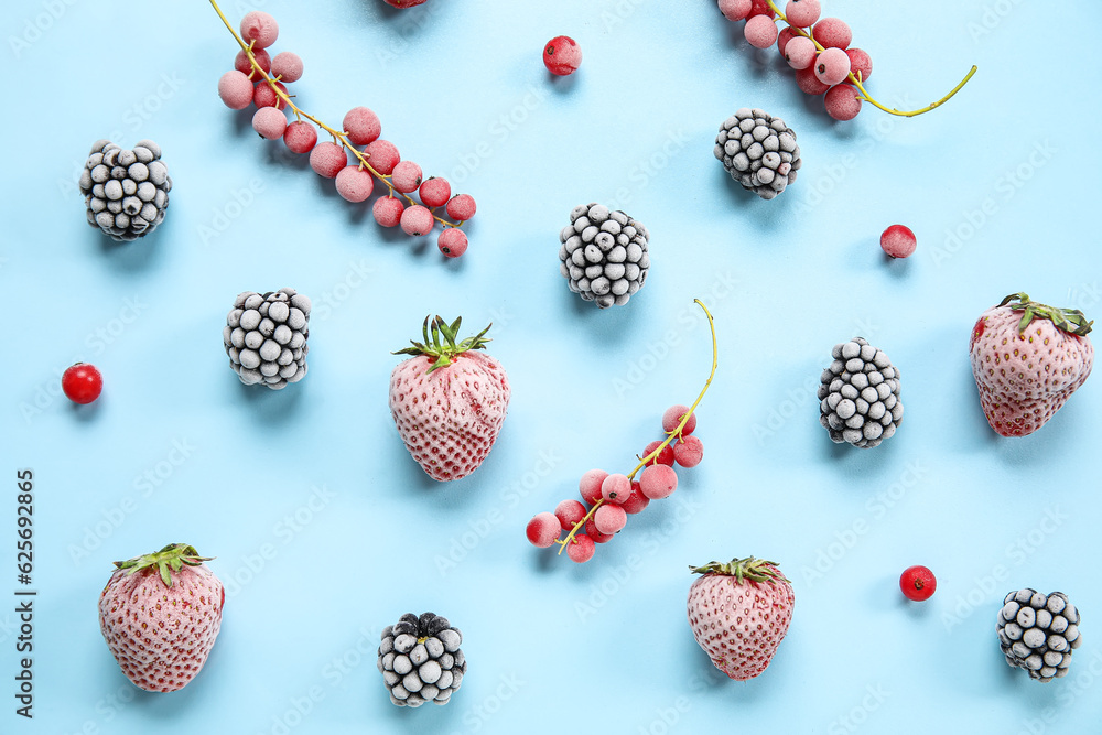 Frozen berries on blue background