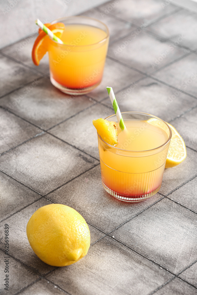 Glasses of tasty mai tai cocktail on table