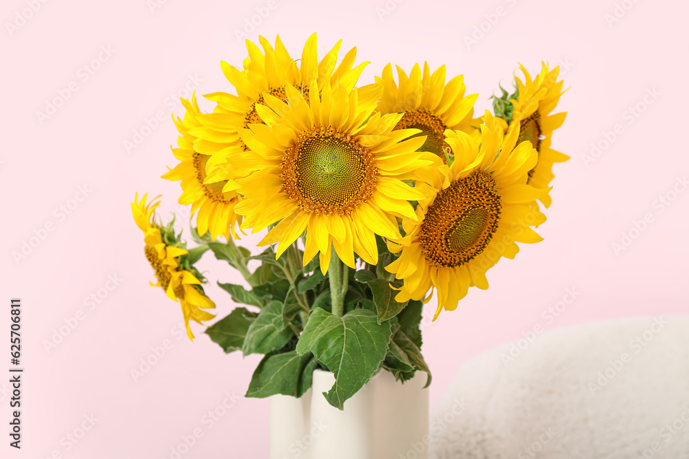 Vase with sunflowers in living room, closeup