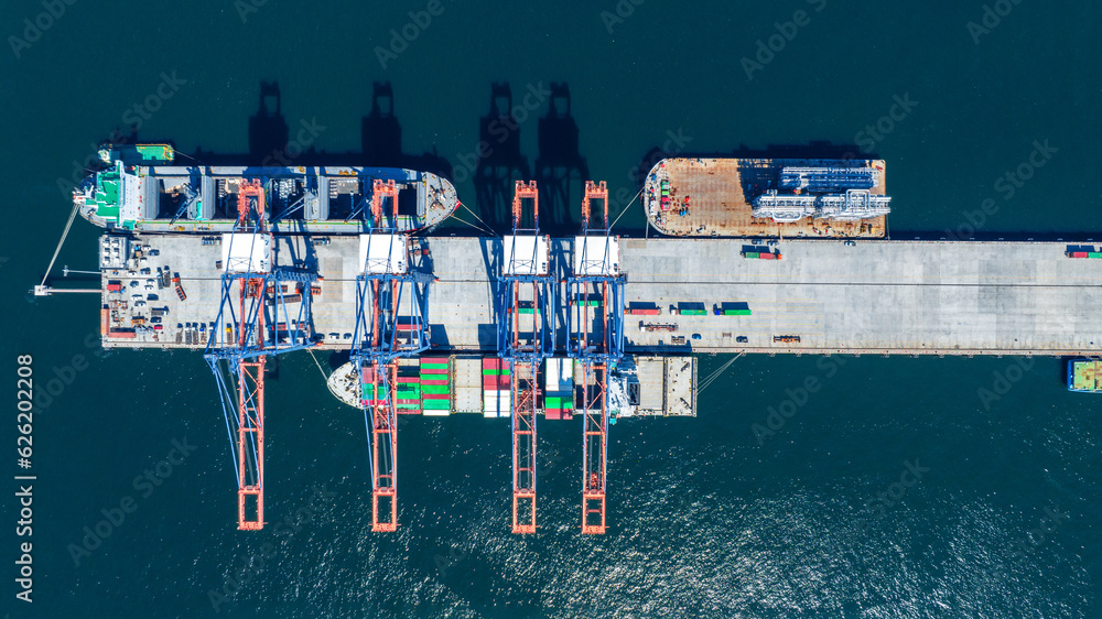 Cargo container Ship running on Bridge Cargo Shipyard. Container ship under the crane Sea Port servi