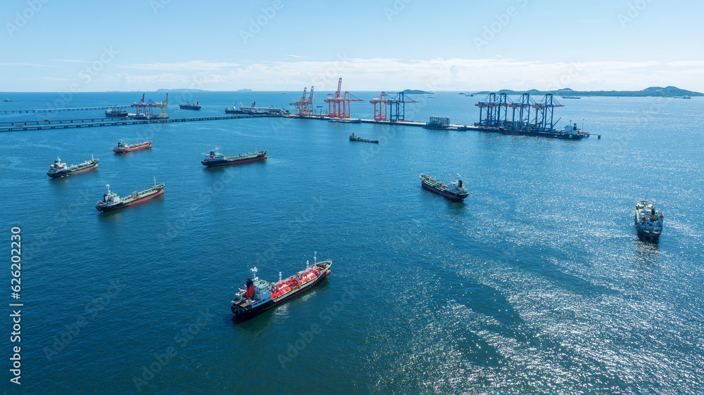 Cargo container Ship running on Bridge Cargo Shipyard. Container ship under the crane Sea Port servi