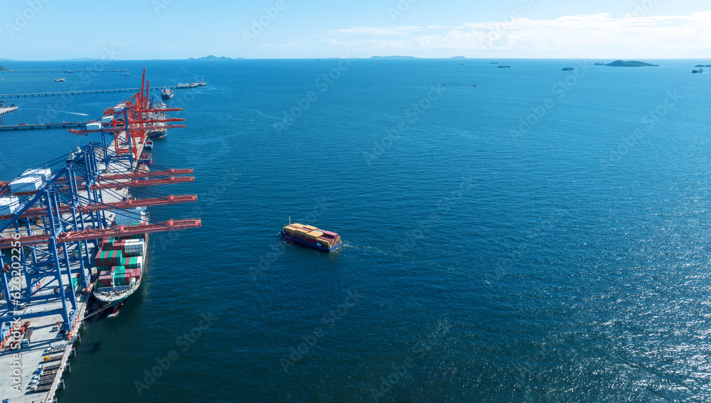 Cargo container Ship running on Bridge Cargo Shipyard. Container ship under the crane Sea Port servi