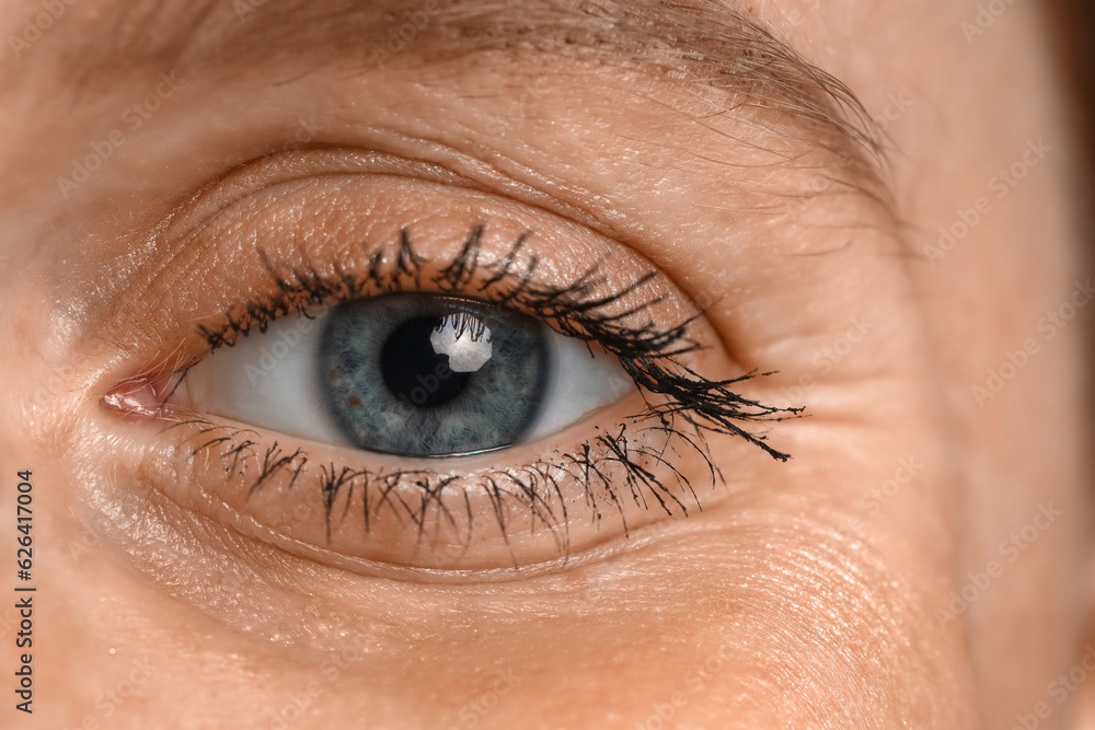 Mature woman with blue eyes, closeup