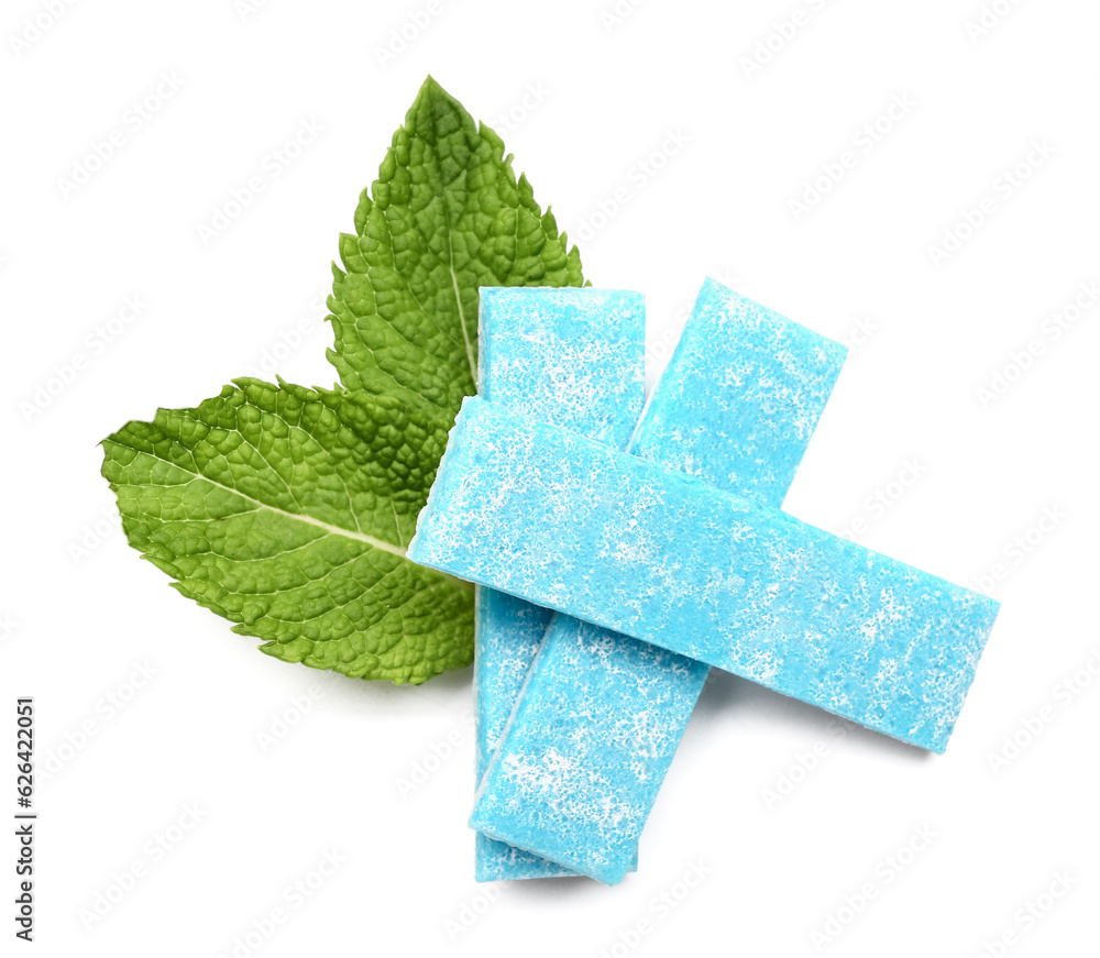 Fresh chewing gums with mint on white background