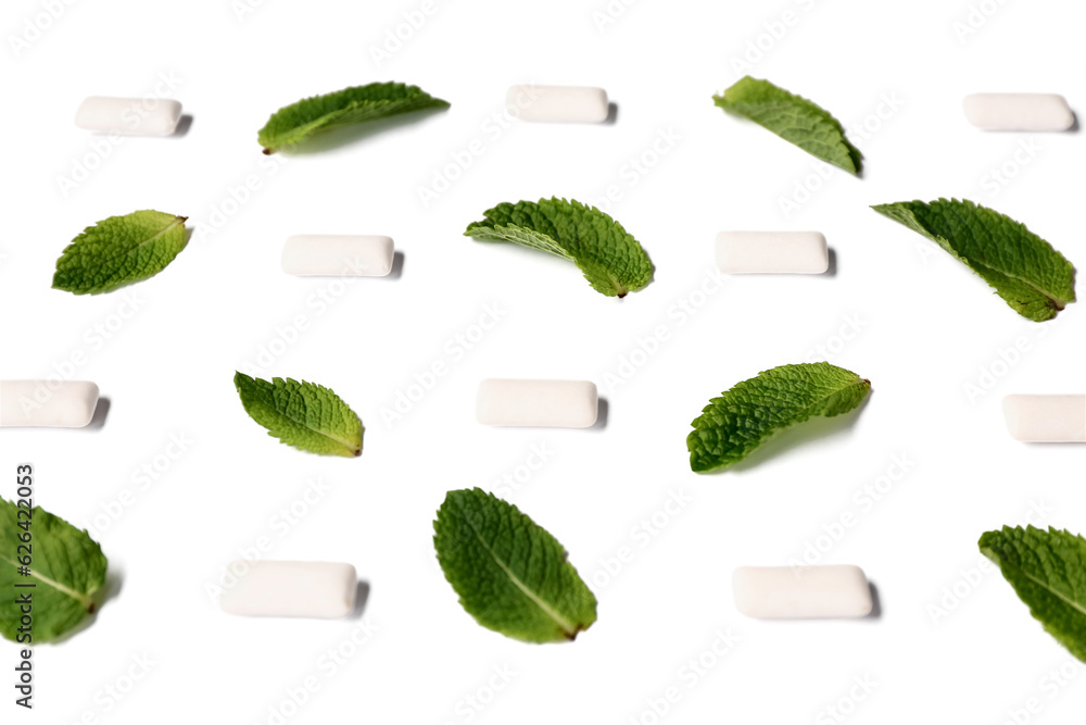 Fresh chewing gums with mint on white background