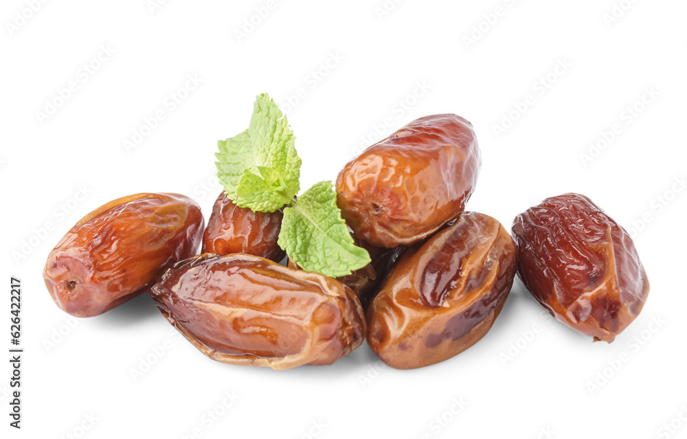 Heap of dried dates on white background