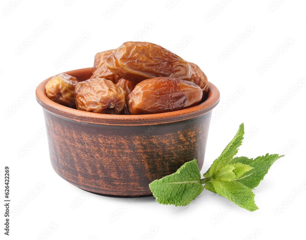 Bowl with dried dates on white background