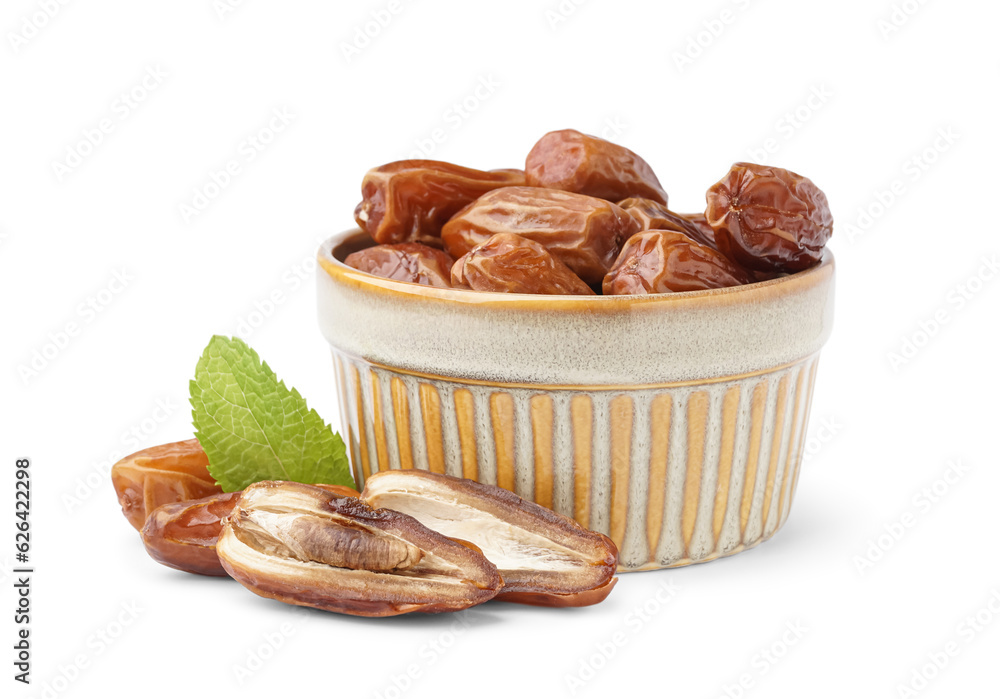 Bowl with dried dates on white background