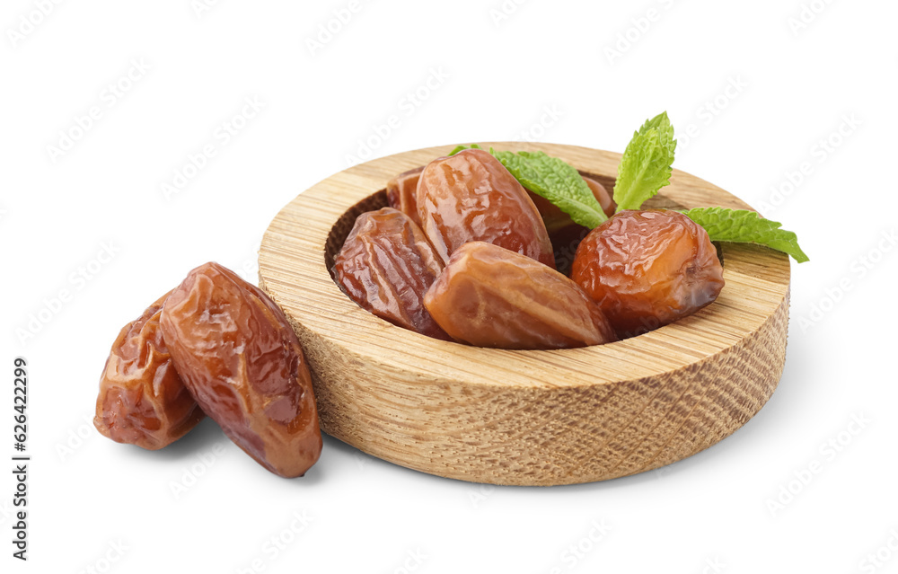 Bowl with dried dates on white background