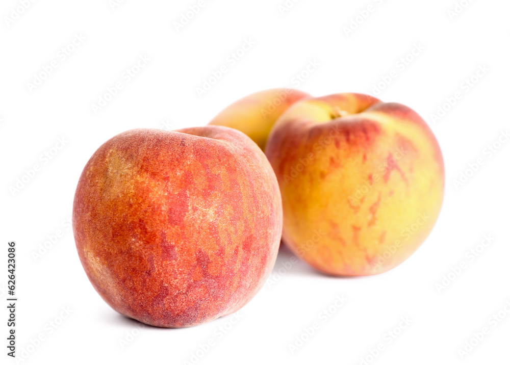 Sweet peaches on white background